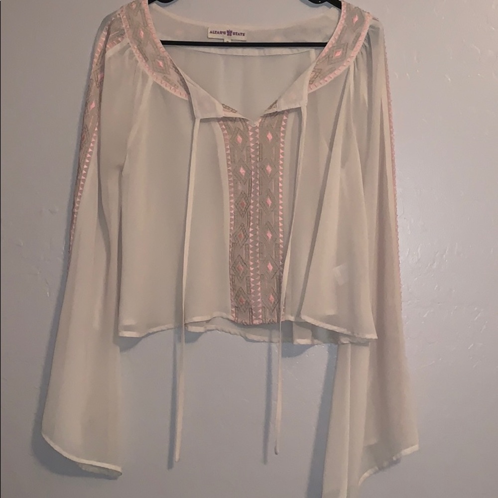 Cream crop top.